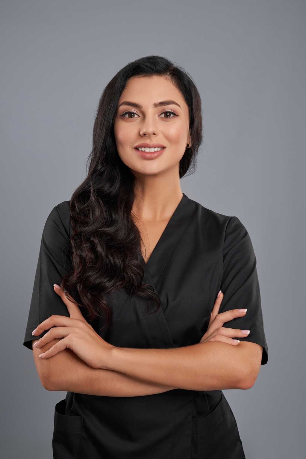 Female Beautician in Black Uniform